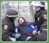 Woman being arrested by police